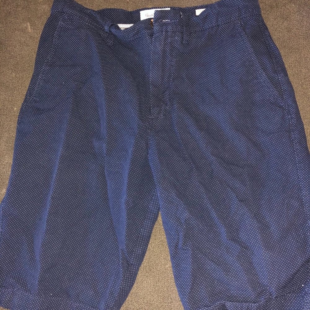 Navy blue men’s chino shorts with small white dots